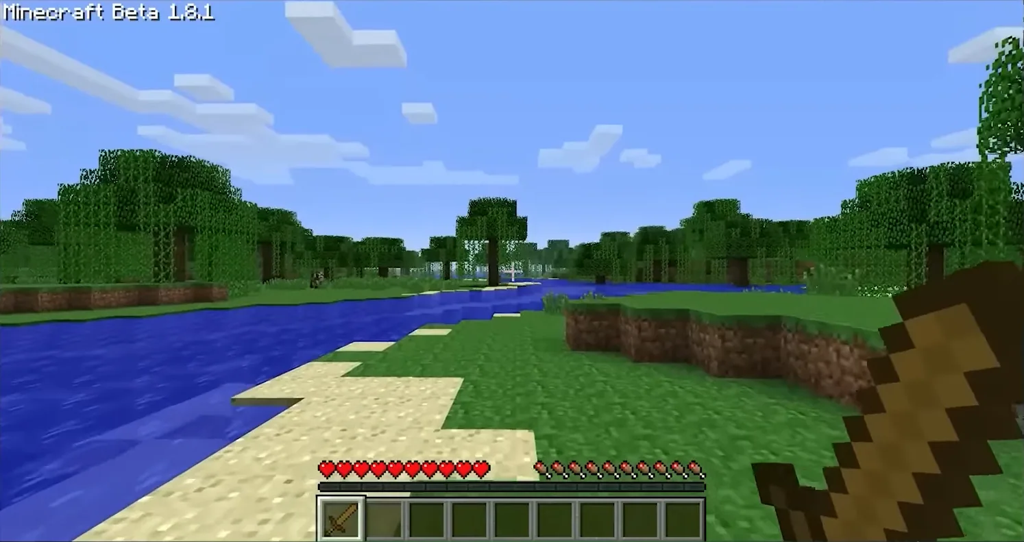 Paysage de Minecraft avec une rivière, une plage de sable et des arbres en cubes